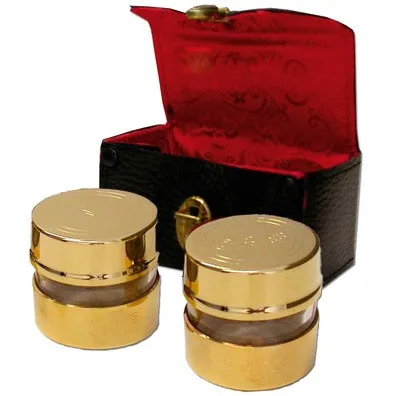 Dos crismeras doradas mod 1